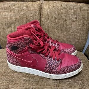 Jordan 1 Retro
Red Elephant Print
Nike Red High-Top Sneakers with Bold Design